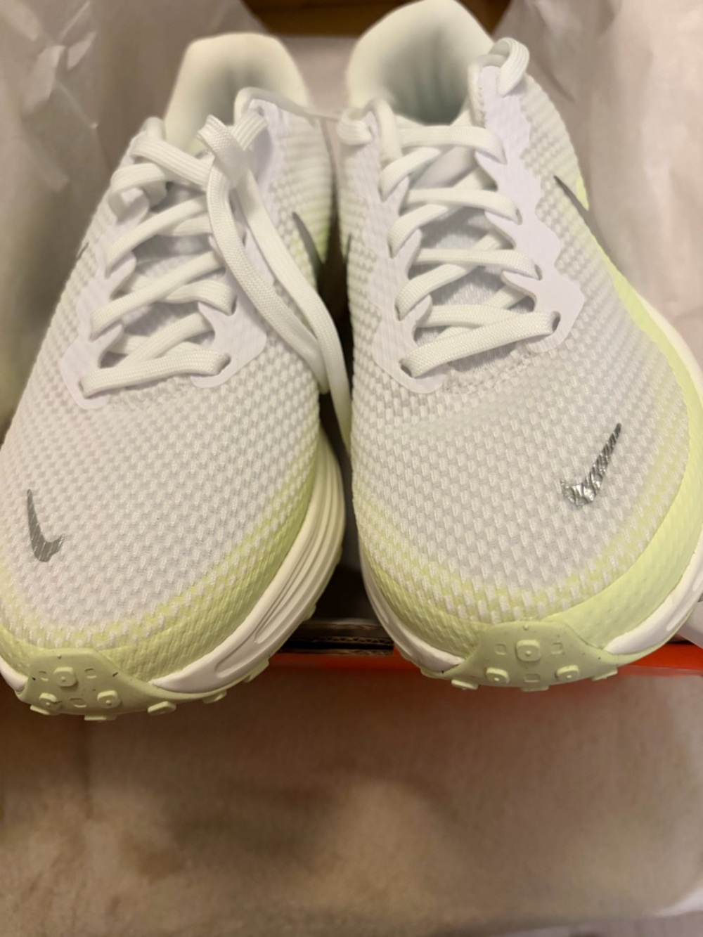 Nike Women’s White Running Sneakers with Pale Green Accents